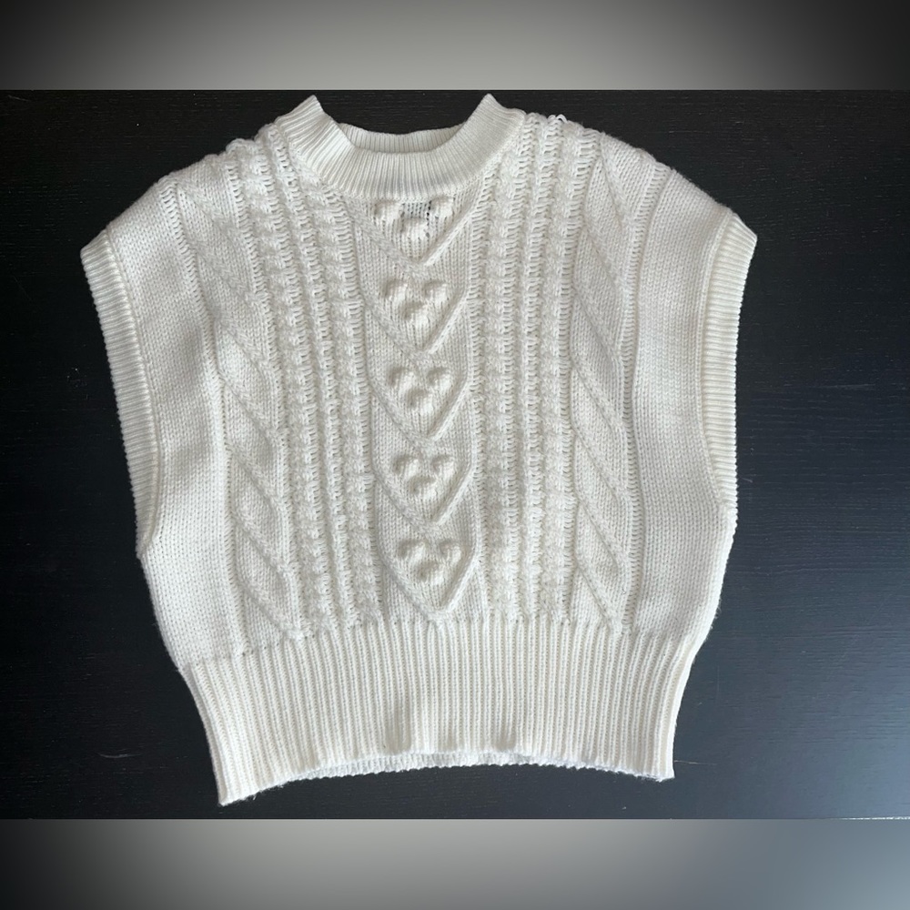 White sweater vest